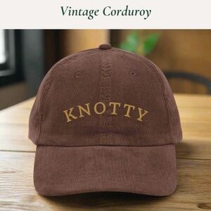 Brown Corduroy Cap – “KNOTTY” Gold Embroidery, NWOT